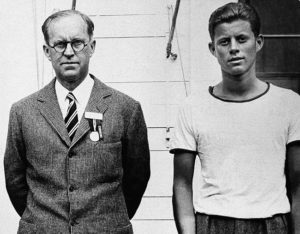 Joseph P. Kennedy, center, member of the Harvard class of 1912, with his two sons at the class celebration. Mr. Kennedy, chairman of the Maritime Commission came to Cambridge, Mass. to attend Harvard commencement on June 23, 1937. He is shown here with Joseph P. Kennedy Jr., left, and John F. Kennedy at right. (AP Photo)